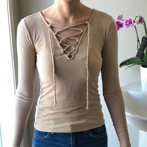 Nude color long sleeve.